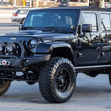 Image of a Jeep Wrangler Body Armor AEV Style Front Steel Bumper with Winch Cradle, Bullbar, Tow Rings for Wrangler JK