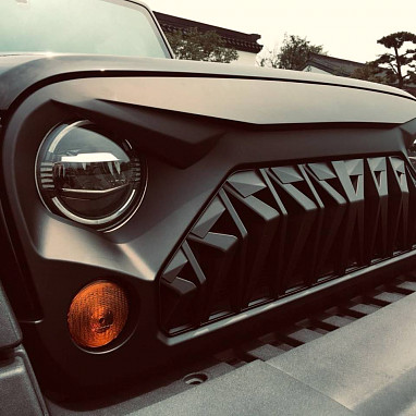 Image of a Jeep Wrangler Angry Grilles Jeep Wrangler JK ABS Armor II Style Front Grill  matte black 1038
