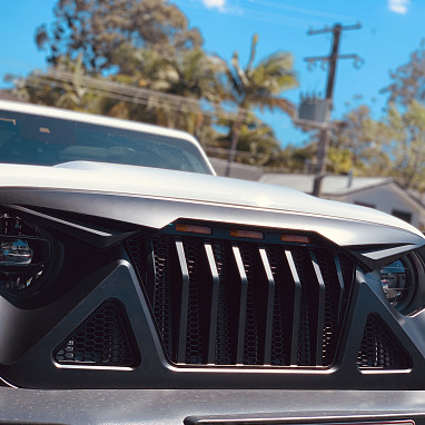Image of a Jeep Wrangler Angry Grilles Jeep Wrangler JL Predator grille with 3 amber led lights 