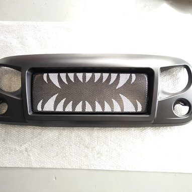 Image of a Jeep Wrangler   Jeep Wrangler JK Spartan Fang Style Angry Grille Matte black