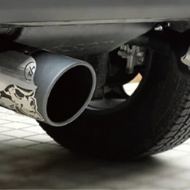 Image of a Jeep Wrangler  Gibson Skull Exhaust Style Stainless Dual Exhaust Muffler System