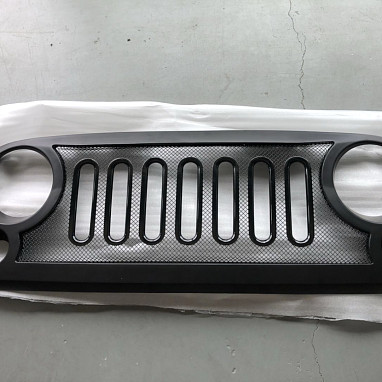 Image of a Jeep Wrangler Angry Grilles  Jeep Wrangler JK ABS Defender Style High Flow Front Grill Grille matte black