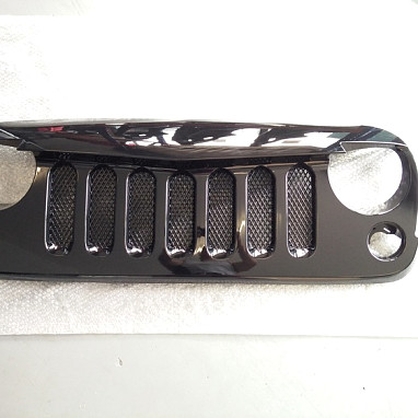Image of a Jeep Wrangler Angry Grilles Angry Bird Grille V Shape Gloss black with Mesh