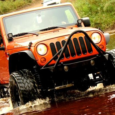 Image of a Jeep Wrangler Body Armor JW0326 Poison Spyder Style Steel Front Winch Bull Bar